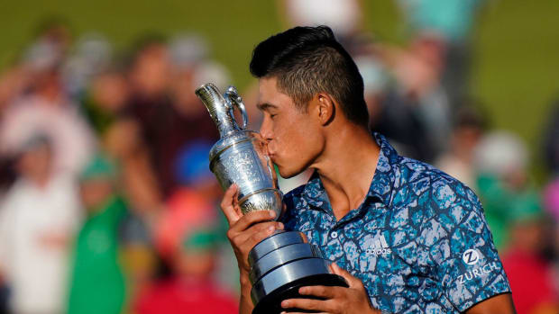 Collin Morikawa with the claret jug.